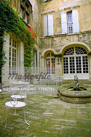 Arles; Bouches du Rhone, France; A courtyard to a high end hotel
