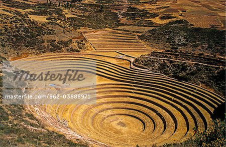 Peru, Andes, Cordillerra Urubamba, Urubamba, Moray. Striking Inca terraces - believed to have been a kind of crop nursey - fill an amphitheatre-like bowl in the hills near Maras.