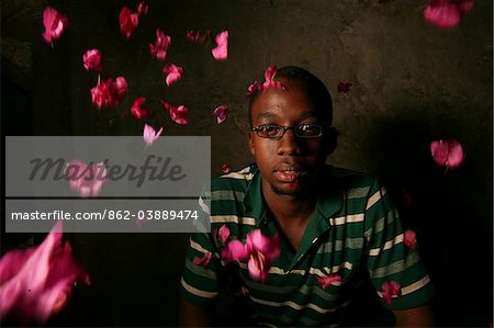 Kiagli, Rwanda. A young Rwandan love poet poses for a portrait.