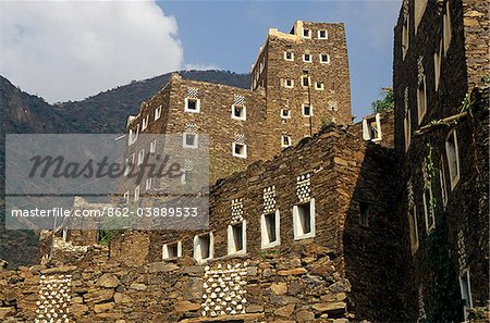 Saudi Arabia, Asir, Rejal- al-amaa. Standing in the Asir Mountains and recently part-restored, the village of Rejal al-Maa's traditional masonry buildings show similarities to the architecture of nearby Yemen.