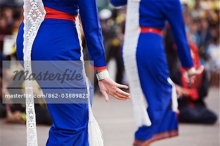 Thailand, Sakhon Nakhon, Sakhon Nakhon.  Phu Thai dancers at the Bai See Su Khwan (blessing ceremony) during the Wax Castle festival.  The festival in October marks the end of the Buddhist Rains Retreat and is celebrated in communities throughout Northeastern Thailand.