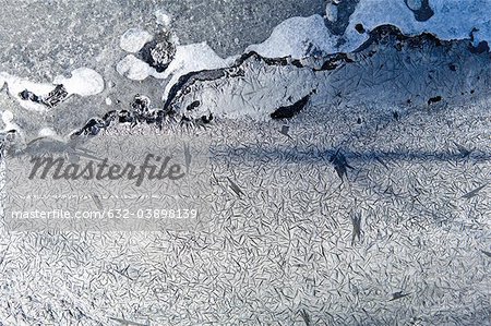 Fractured surface of frozen river, full frame