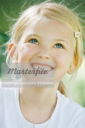 A Scandinavian girl smiling in the sun, Sweden.
