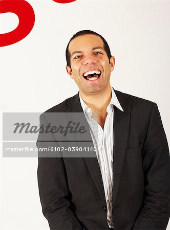 Portrait of a laughing man in a suit, Sweden.