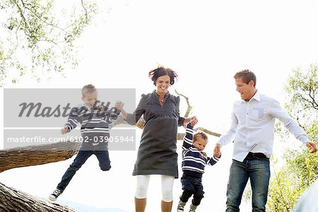 Parents and children jumping