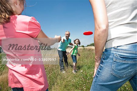 Family Playing Frisbee, Mannheim, Baden-Wurttemberg, Germany