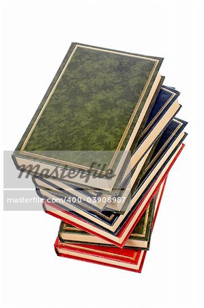 A vertical pile of books isolated on white background