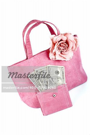 Pink handbag with money on white background