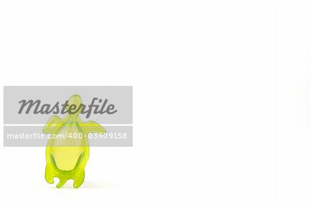 bath soap in the shape of a green tortoise, isolated on white background
