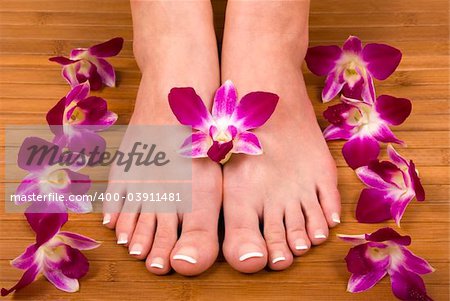 Spa treatment with fresh beautiful orchids
