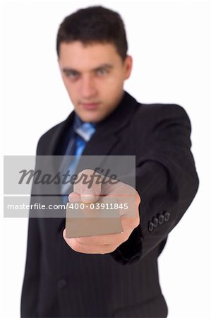 Young man giving gold card; White background in studio. Focus on the card. Body unfocus.