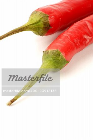 Chilli peppers against a plain background