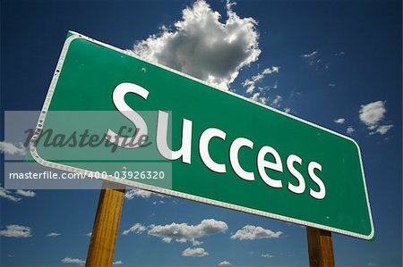 "Success" Road Sign with dramatic blue sky and clouds.