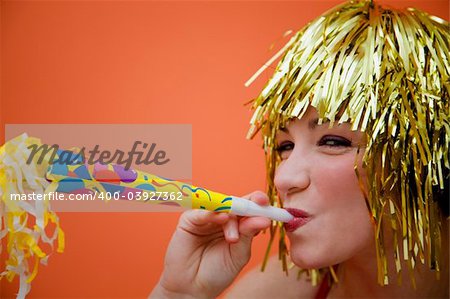 Holiday: beautiful girl having fun at a carnival party