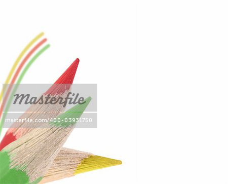 Close-up of three colored pencils isolated on white