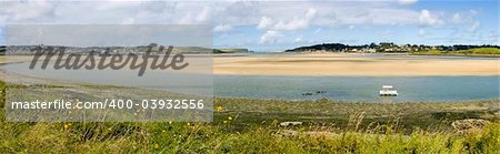 view from the camel trail cycleway and footpath along disused railway line the estuary of the river camel padstow and rock cornish coast cornwall england uk