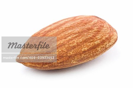 Closeup of almond nuts kernel isolated on white background.