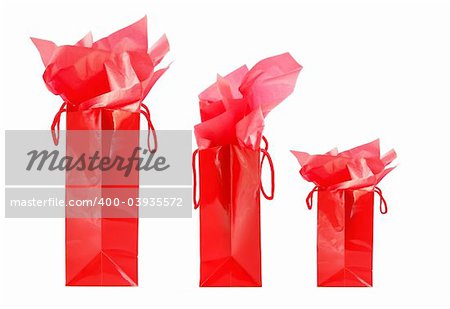 Three red shopping bags isolated on white background