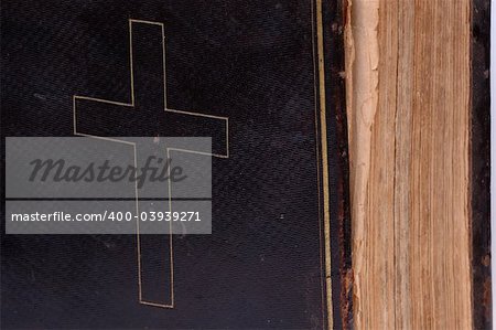 Old bible, over 100 years old, taken on clean white background.