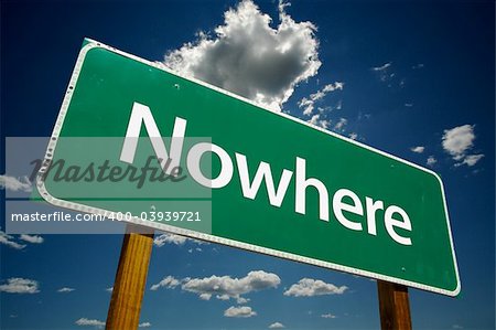 "Nowhere" Road Sign with dramatic blue sky and clouds.