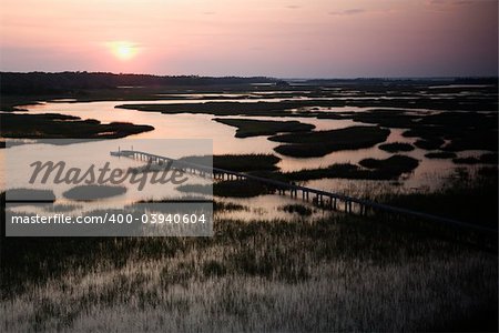 Aerial view of pier in coastal wetland on Bald Head Island, North Carolina.