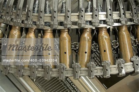 Details of a machine gun on an old fighter plane