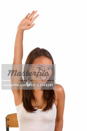 Student rises hand signaling that she is ready to answer