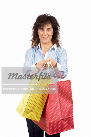 Happy young shopping girl smiling with shopping bags, isolated on white background
