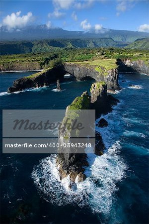 Aerial of rocky coast on Pacific ocean in Maui, Hawaii.