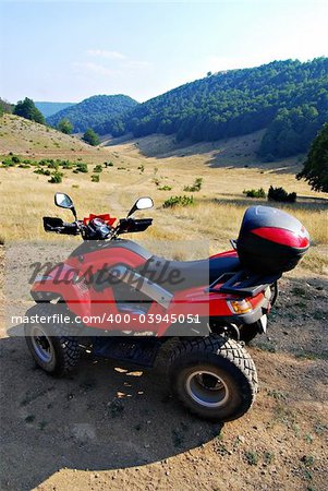 red quad bike in nature