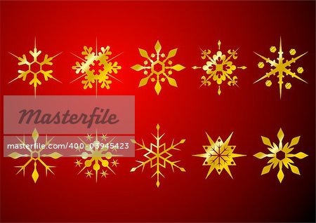 Different golden snow crystals over red background