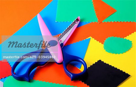 many colourful paper, cutting out scissors