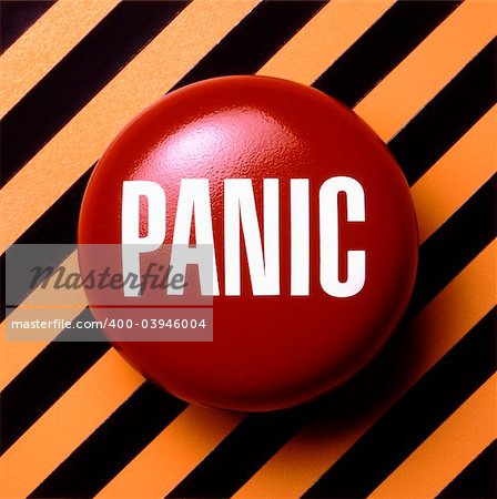 Panic button in red and white on orange and black background
