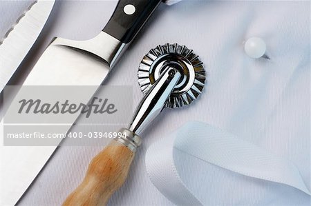 Chef's uniform and tools of trade. Suitable image for training, education and cooking school.