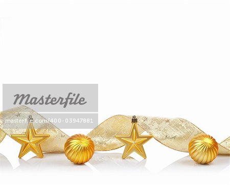 A golden Christmas ornaments, reflected on white background with space for text