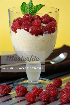 Raspberrys with whipped cream dessert