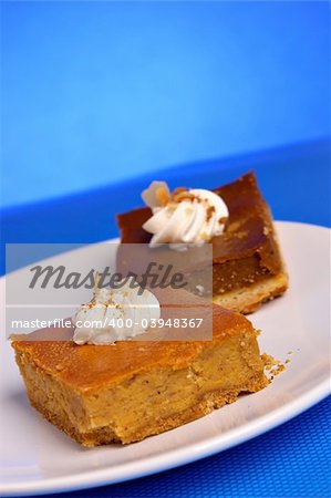 Two pumpkin cakes on a plate