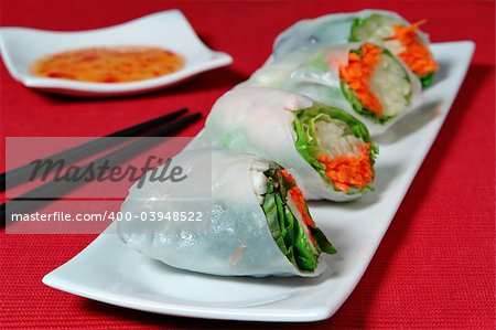 Sushi Rolls on red background