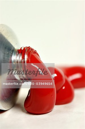 Open tube of Red Paint