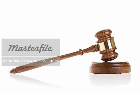 Gavel on white background with reflection