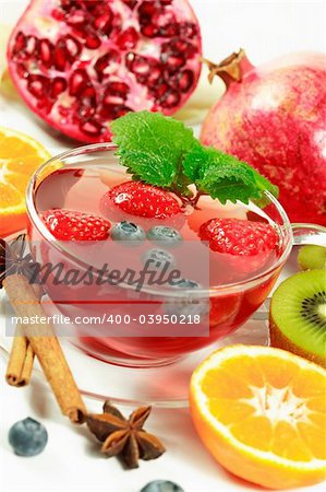 Winter fruit tea with fresh fruits