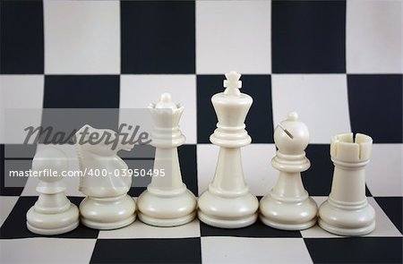 an iamge of white chess pieces