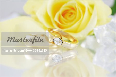 Wedding still life with beautiful golden rings