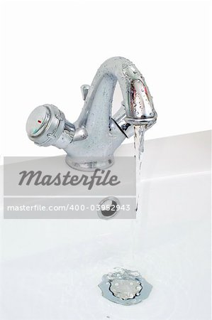 Tap with turn on water in wash-basin