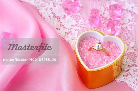 wedding / valentine's / background Ring with a brilliant in a gift with love