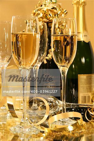 Champagne glasses with champagne bottles  ready  for  festivities