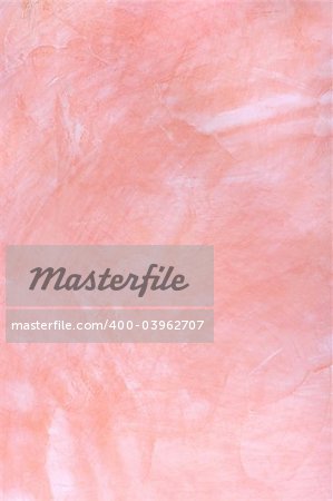 pink plaster with a deep relief on a wall