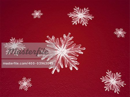 crystal snowflakes over red background with feather center