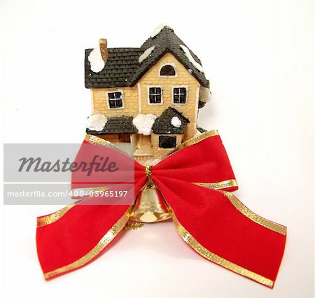 Winter toy-house with red bow