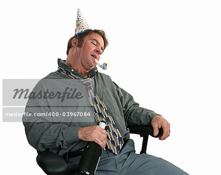 A man passed out in a chair after the office party. (horizontal view)